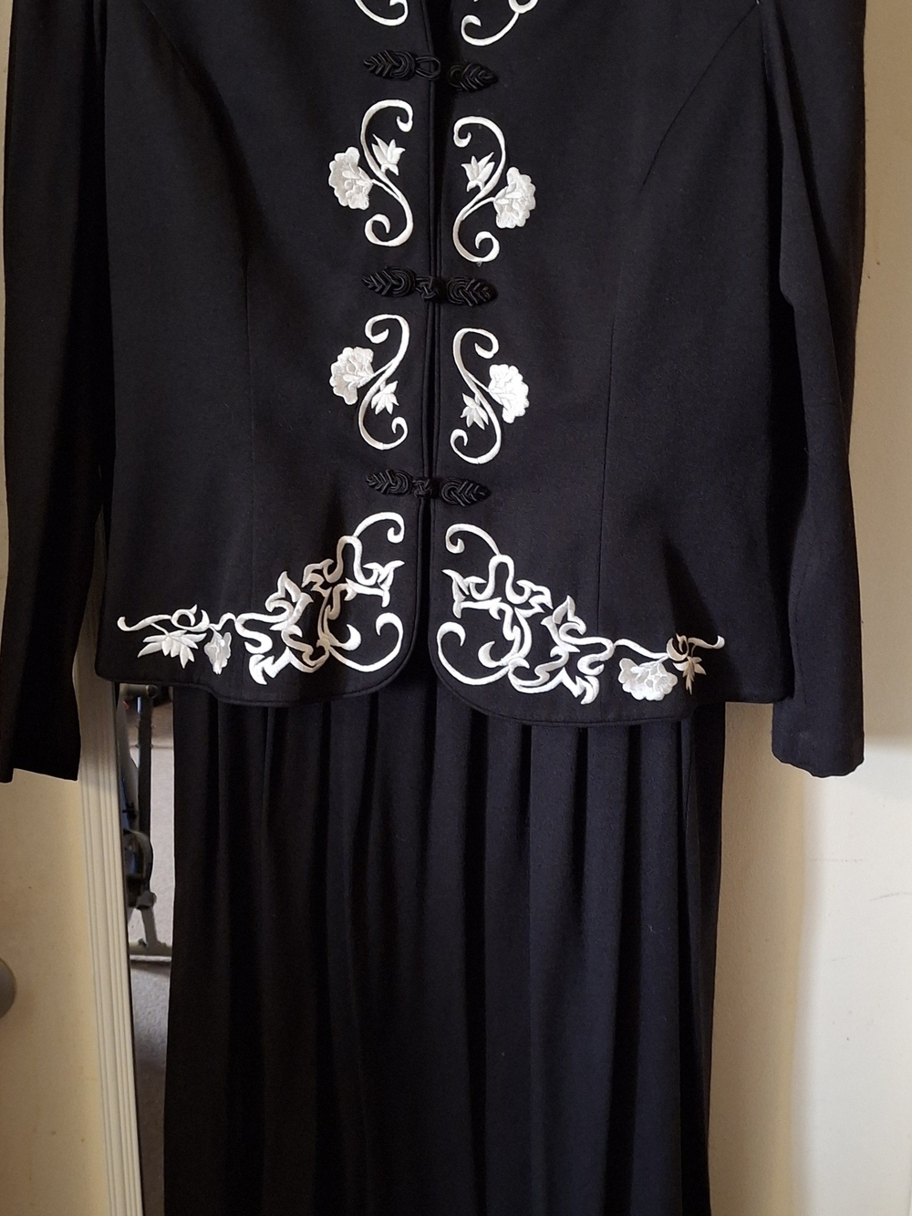 karin stevens Black One-Piece Ensemble with White Floral Embroidery